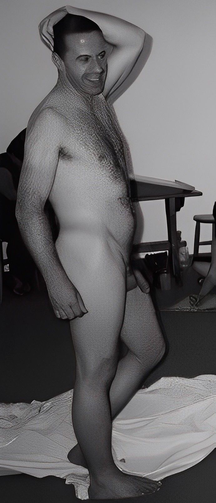 Nude naked male model posing for life drawing art class