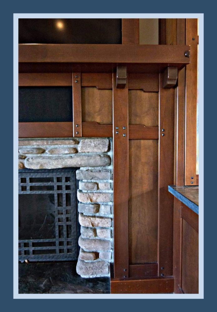 Fireplace with stone and dark wood details.