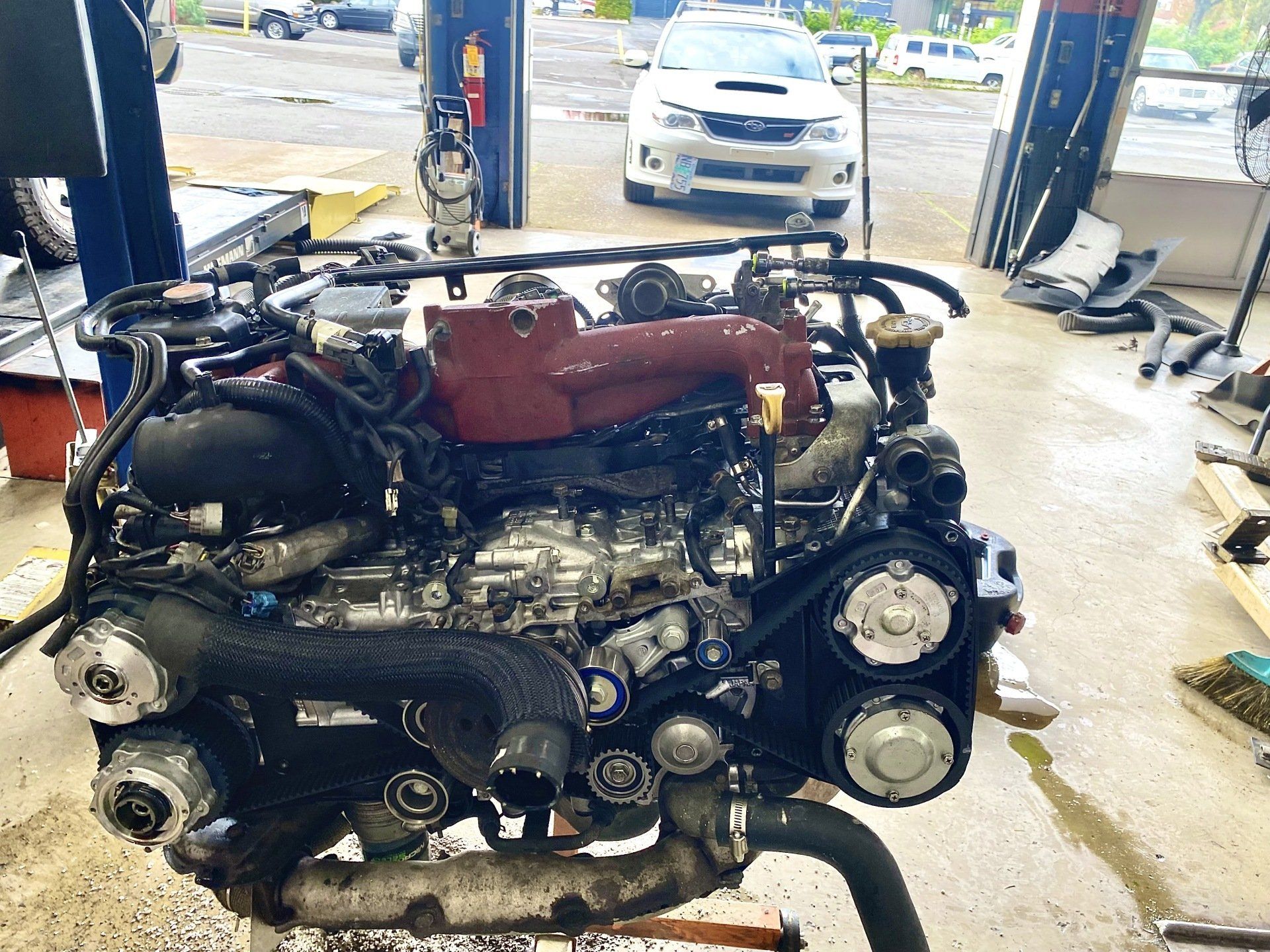 Mechanic Fixing Car Engine — Tualatin, OR — Upscale Automotive