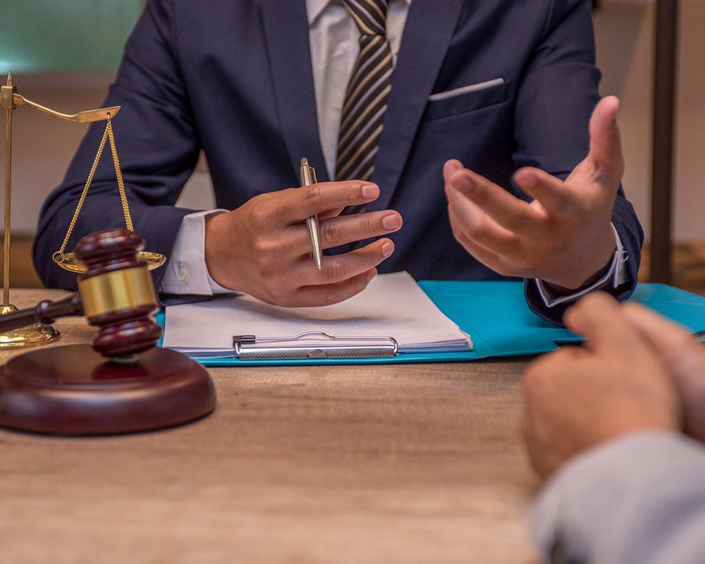 Businessman and Lawyer Discussing Investment Plan — Clinton Township, MI — Gigliotti & Associates, PC