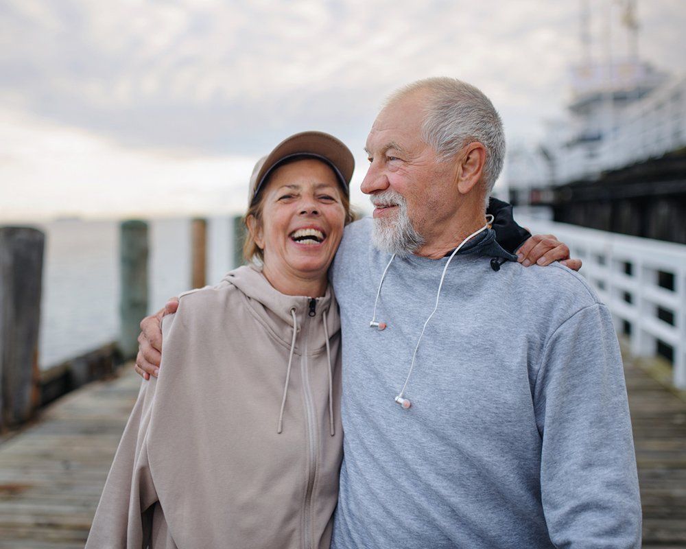 Senior Couple Runners Taking a Break — Clinton Township, MI — Gigliotti & Associates, PC