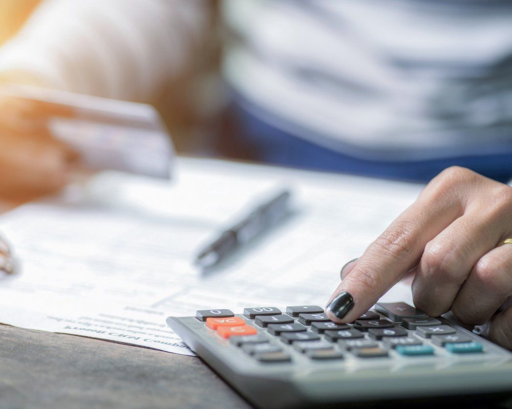 Agent Calculating Credit Card Balance — Clinton Township, MI — Gigliotti & Associates, PC