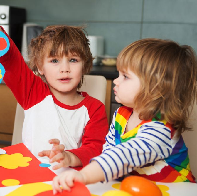 Two Young Children Craft at a Table — Five Star Family Day Care In Newcastle, NSW