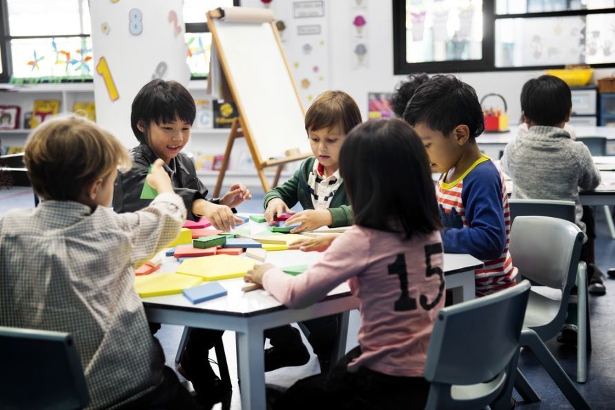 Children at a Table in a Classroom, Crafting — Five Star Family Day Care in Lake Macquarie, NSW
