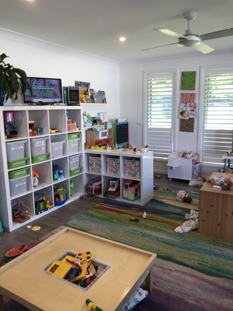 A Living Room Filled With Lots of Toys and a Table — Five Star Family Day Care in Lake Macquarie, NSW