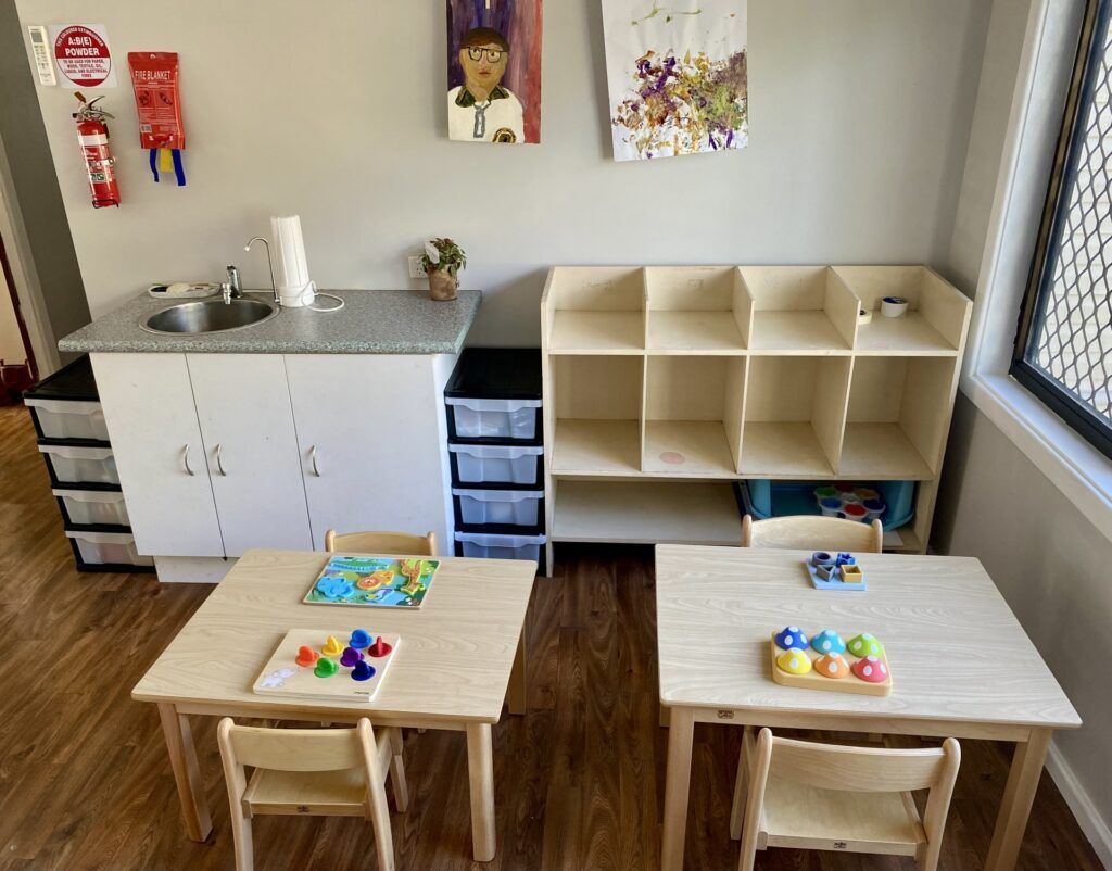 Playroom with Tables, Sink, Storage, and Educational Toys — Five Star Family Day Care in Newcastle, NSW