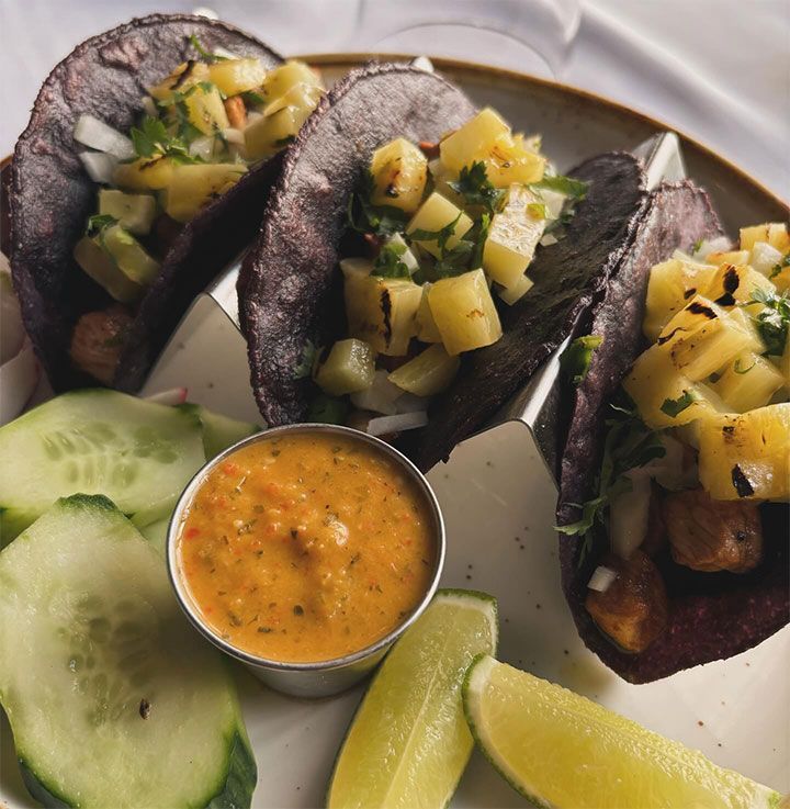 plate of food with vegetables and sauce
