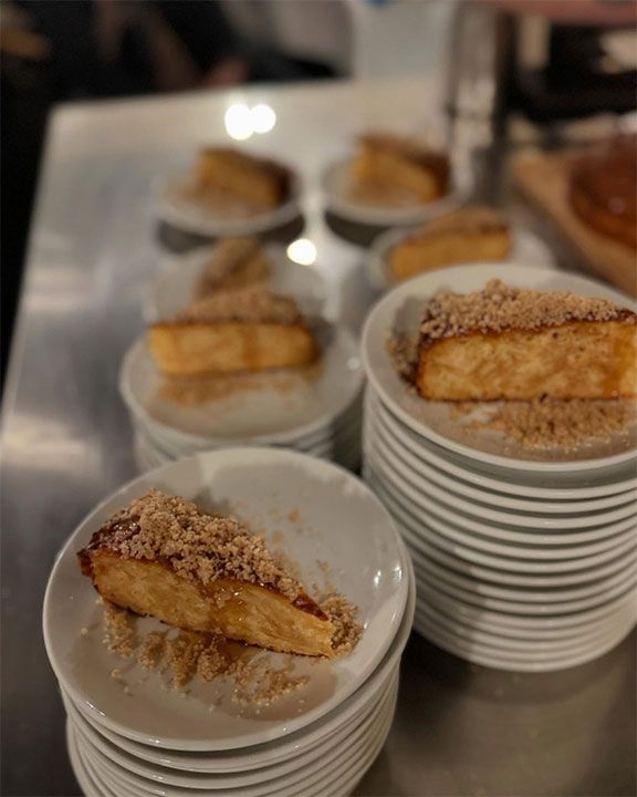 white plates with a piece of cake on them