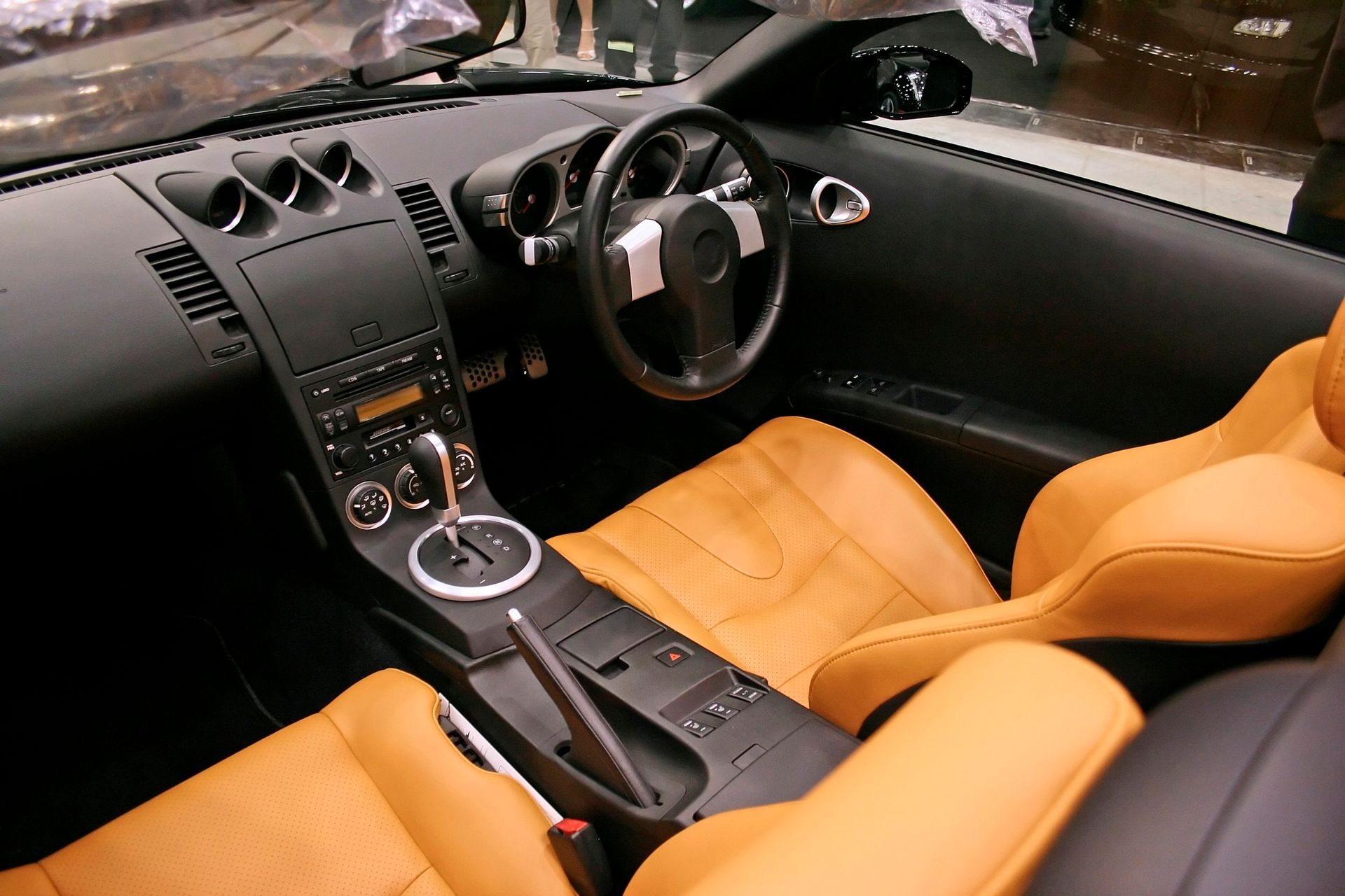 The interior of a car with brown seats and a steering wheel | Ruckersville, VA | KEL-CAM Tire & Auto