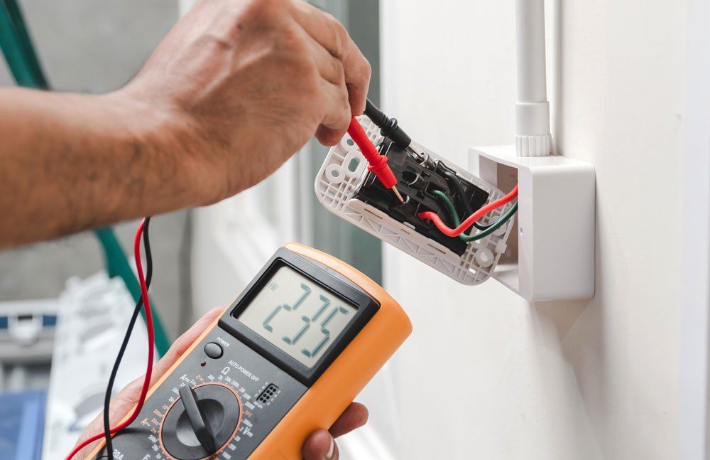 Electrician Inspecting Electrical Wiring — Coopersburg, PA — Doelp Electric