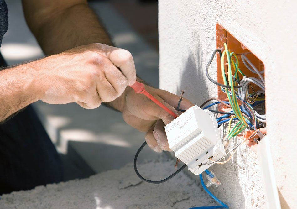 Electrician Fixing Wires — Coopersburg, PA — Doelp Electric