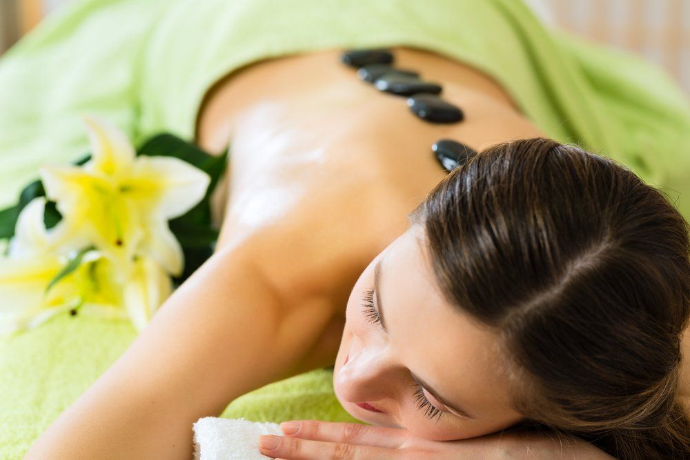 Wellness Stone Back Massage — Massage in Mount Louisa, QLD