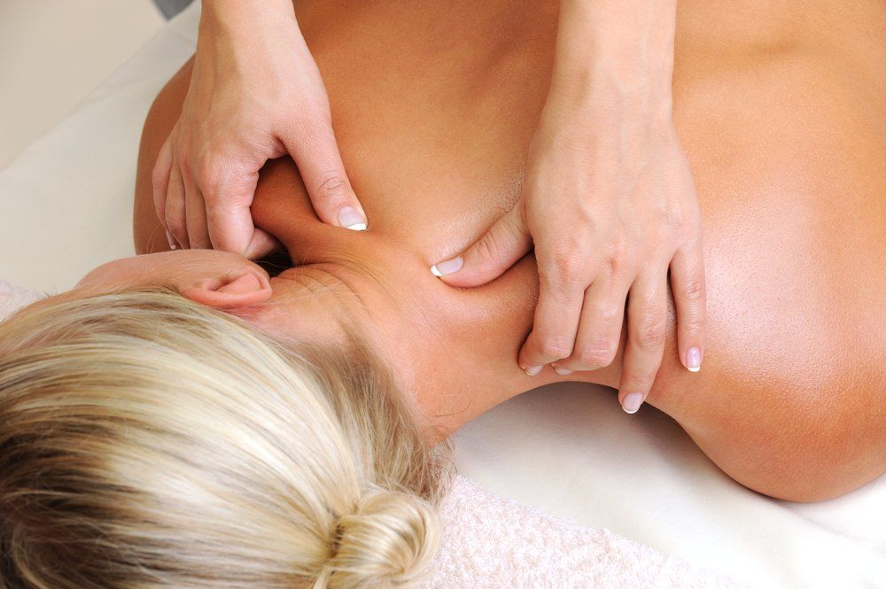 Woman Having Back Massage — Massage Therapist in Mount Louisa, QLD