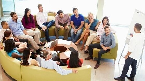 Business owner planning tax strategy with advisors.