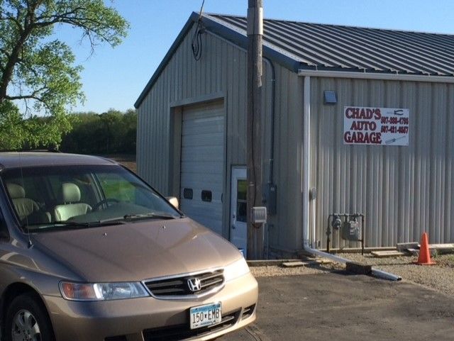 Mechanic Repairing A Car — Rochester, MN — Eastside Storage