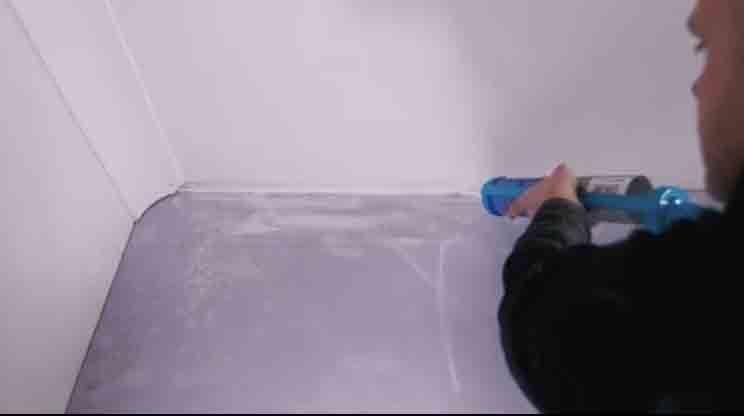 Adding acoustic sealant to the perimeter