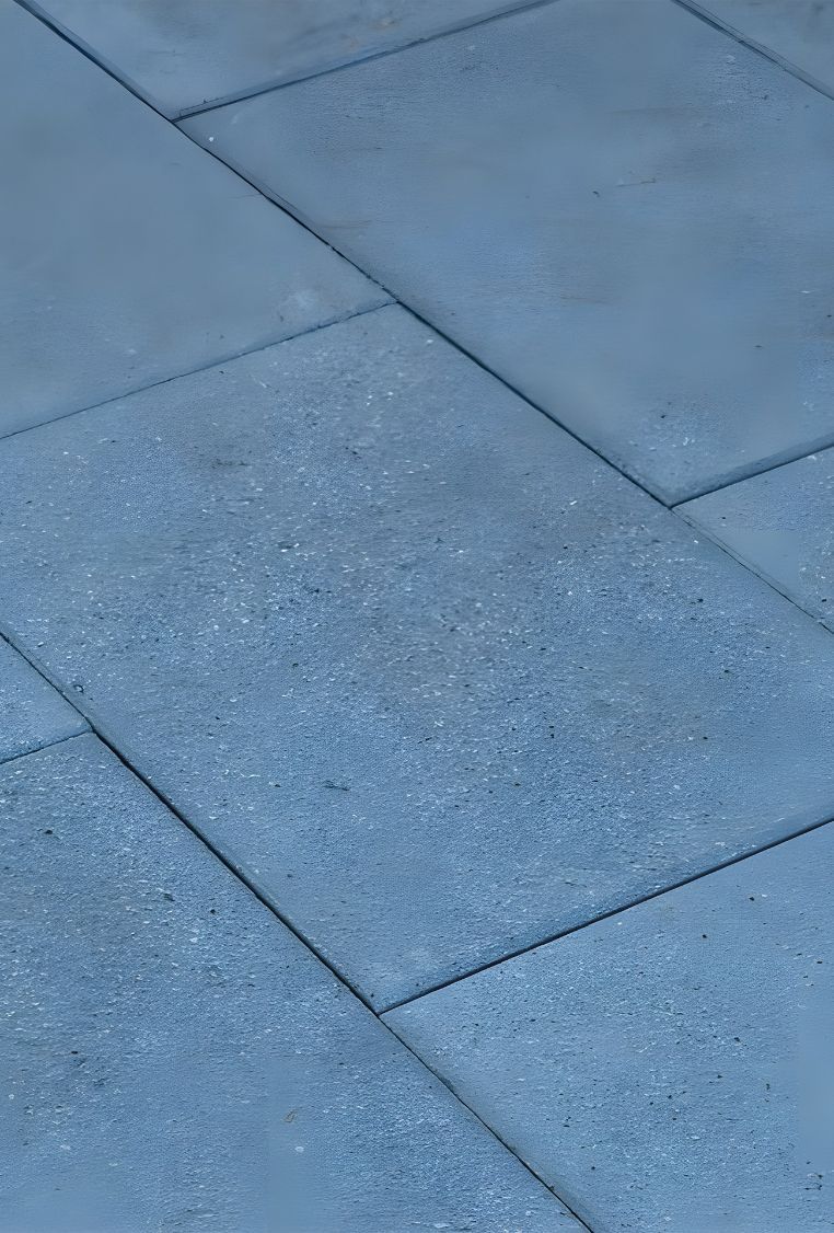 A Close Up Of A Blue Tile Floor — Premier Bricks, Blocks & Pavers In Lake Macquarie, NSW