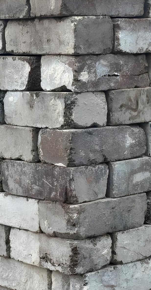 A Lot Of Bricks Stacked On Top Of Each Other — Premier Bricks, Blocks & Pavers In Port Stephens, NSW
