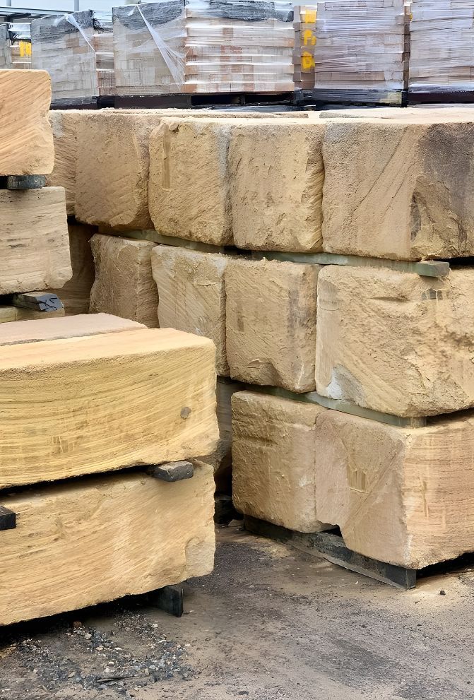 A Pile Of Bricks Stacked On Top Of Each Other On Pallets — Premier Bricks, Blocks & Pavers In Huntlee, NSW