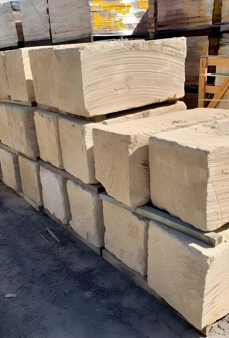 A Pile Of Bricks Stacked On Top Of Each Other On The Ground — Premier Bricks, Blocks & Pavers In Huntlee, NSW