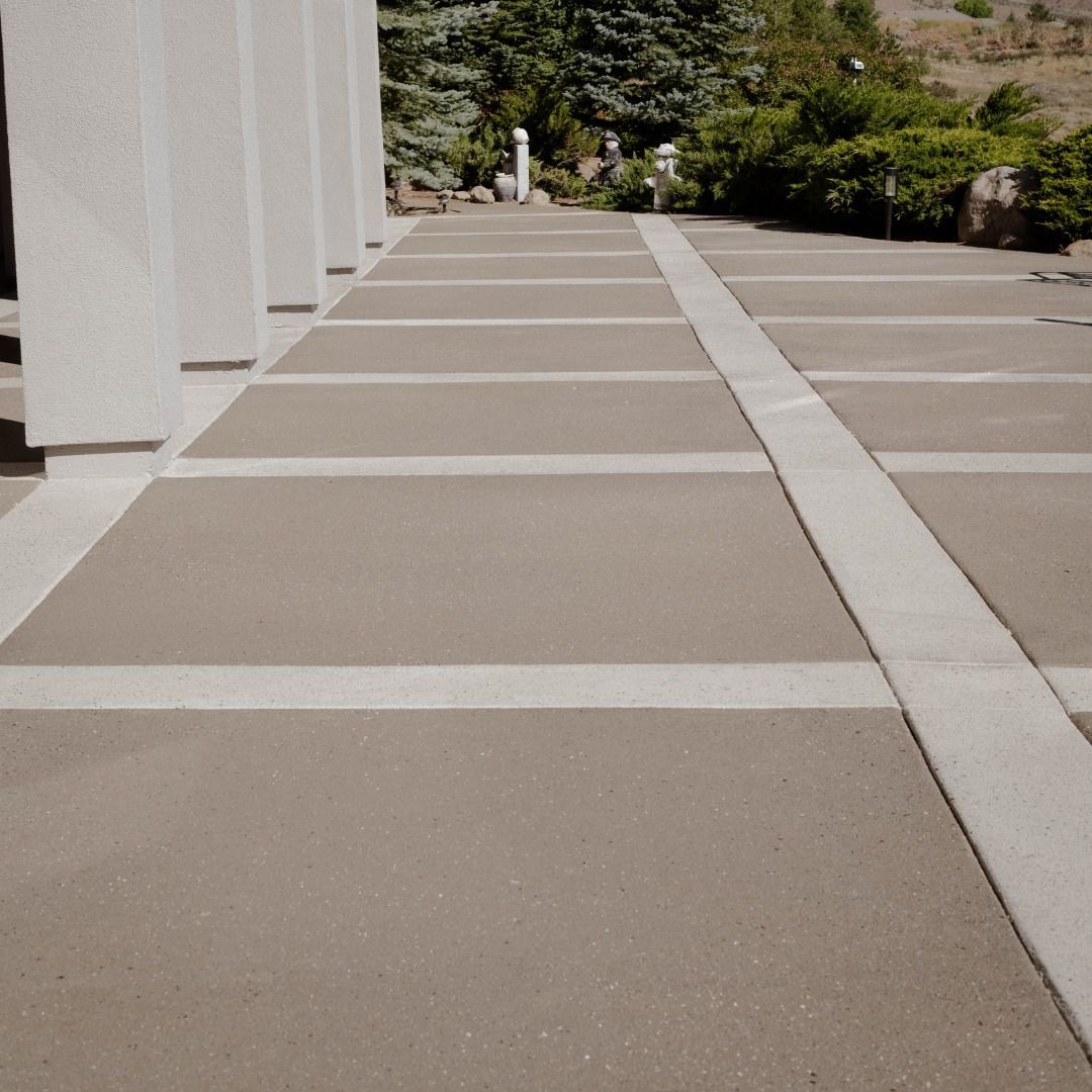 A row of concrete walkways with white stripes