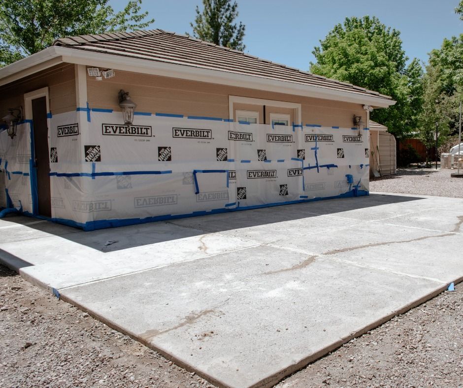 A building with a lot of tape on it that says everlast