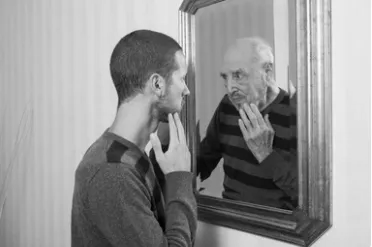 Man Looking at his Old Reflection