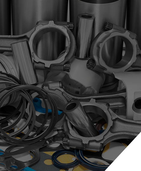 Piezas de motor: bielas, juntas y otros componentes, probablemente para reparación de automóviles.