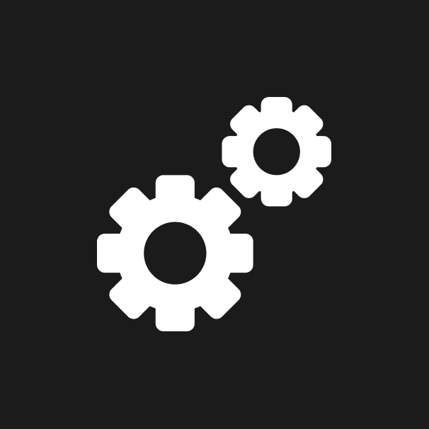 Dos ruedas dentadas blancas sobre fondo negro, que sugieren ajustes o configuración.