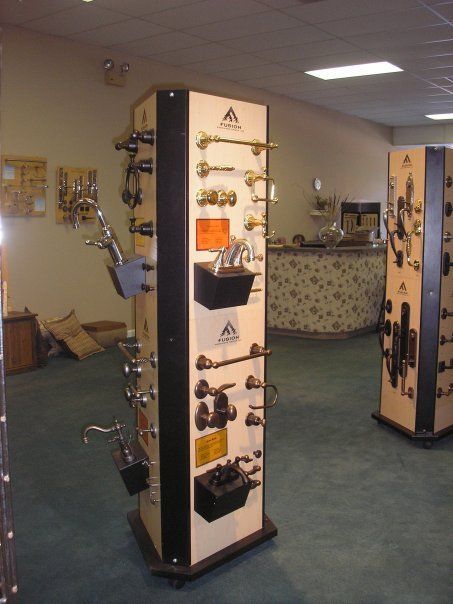 A display of hardware in a store with a sign that says ' a ' on it