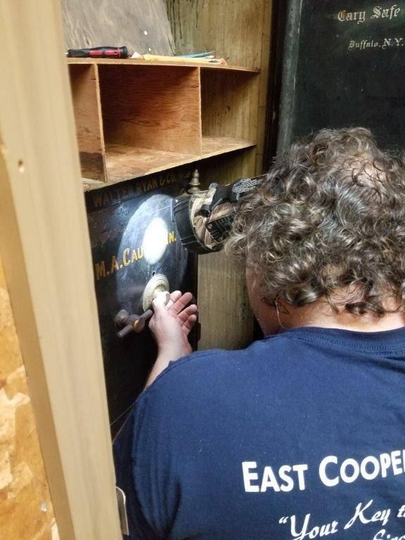 A man wearing a blue shirt that says east cooper