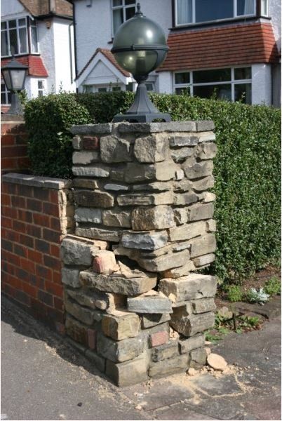 damaged ragstone pier