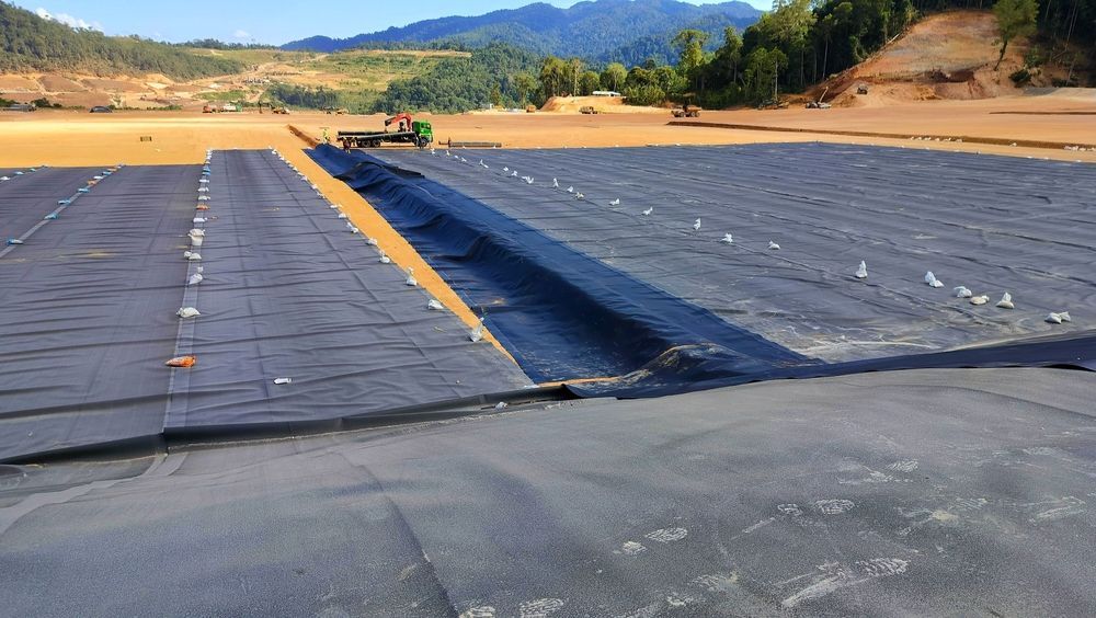 Black Tarp-covered Landfill With a Drainage Ditch — Canobolas Canvas In Orange, NSW