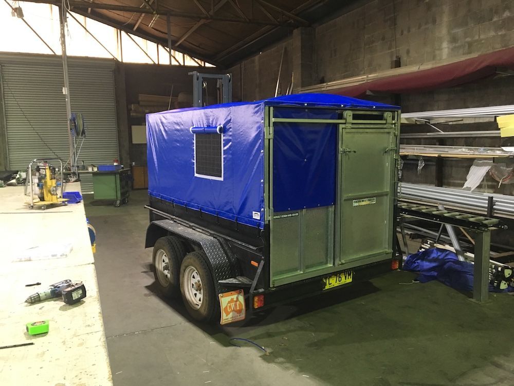 A Blue-topped Enclosed Trailer Inside a Warehouse — Canobolas Canvas In Orange, NSW