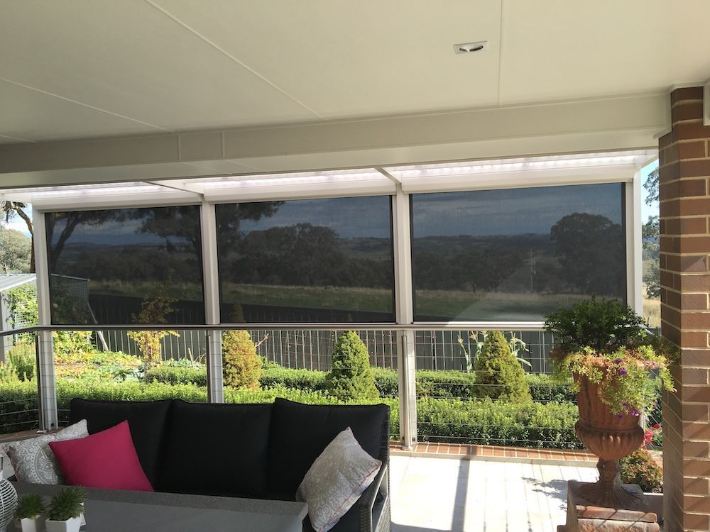 Outdoor Patio with Black Shades and Seating — Canobolas Canvas In Orange, NSW