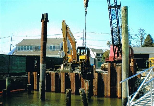 Installation of new sheet pile bulkhead in preparation for construction of travel lift pier