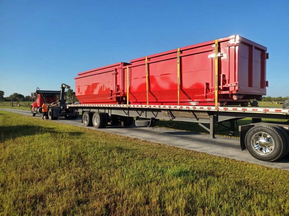 Two Dumpster on Flatbed Truck — Melbourne, FL — Braggs Roll-Off Dumpsters Inc.