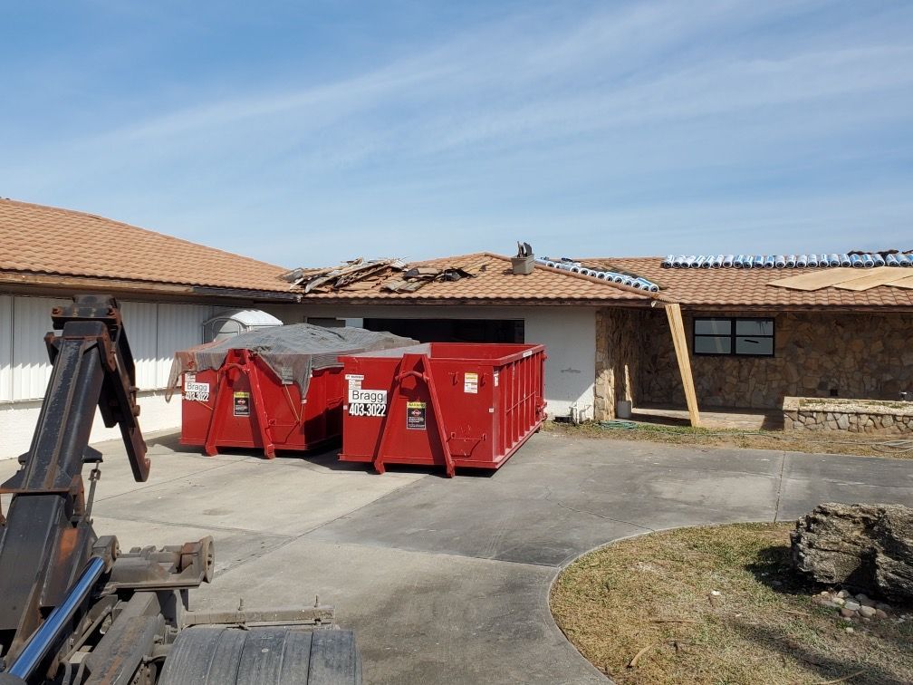 Filled and Unfilled Dumpsters — Melbourne, FL — Braggs Roll-Off Dumpsters Inc.