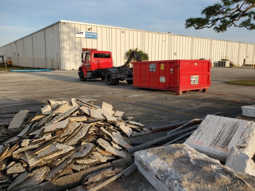 Dumpster and Debris  — Melbourne, FL — Braggs Roll-Off Dumpsters Inc.