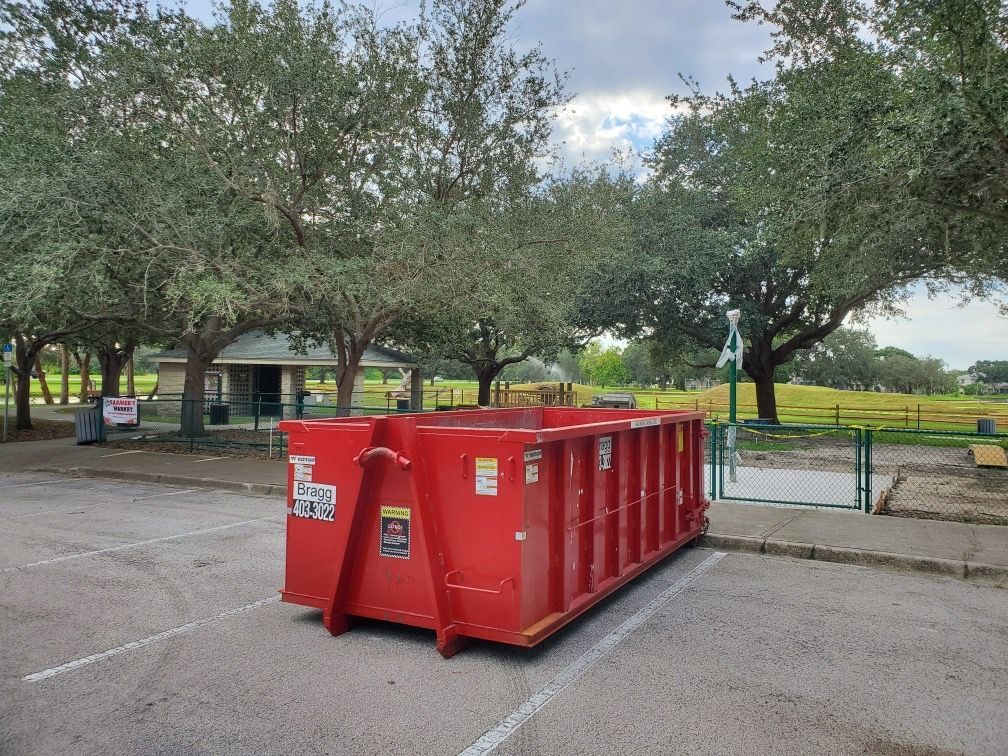 Red Dumpster — Melbourne, FL — Braggs Roll-Off Dumpsters Inc.