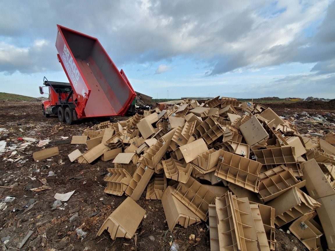 Dumping on a Landfill — Melbourne, FL — Braggs Roll-Off Dumpsters Inc.