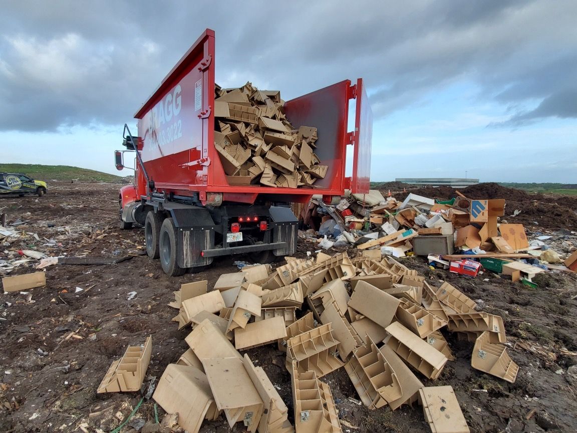 Dumping Debris — Melbourne, FL — Braggs Roll-Off Dumpsters Inc.