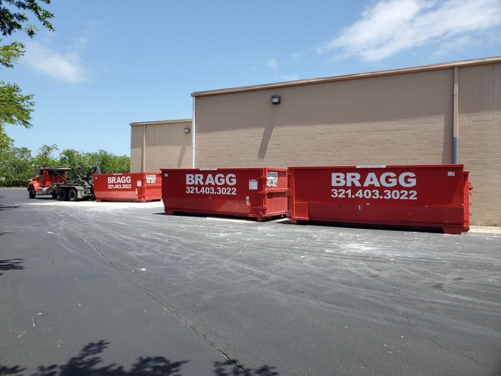 Dumpsters and Dumspter Truck — Melbourne, FL — Braggs Roll-Off Dumpsters Inc.