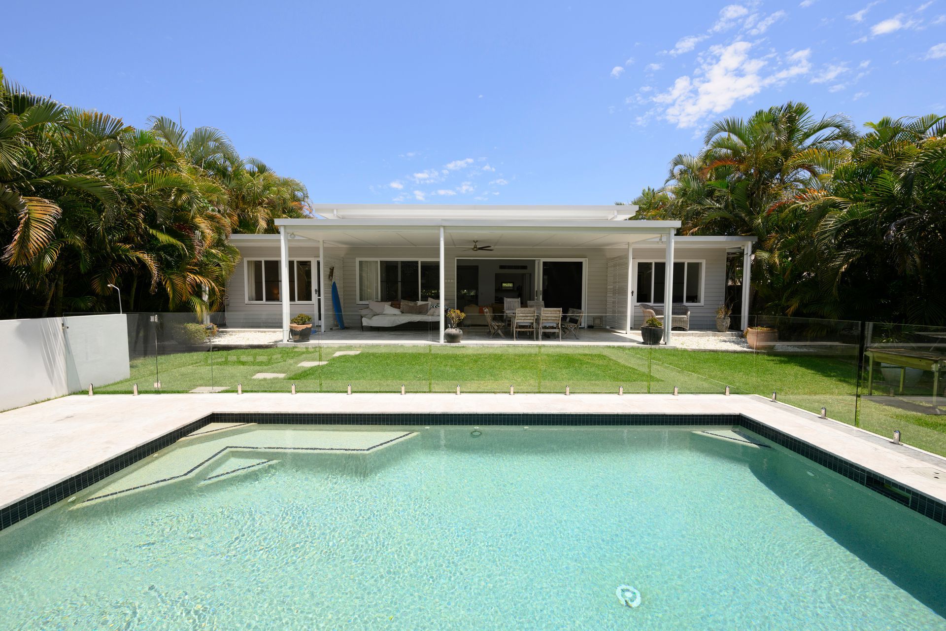 A large white house with a swimming pool in front of it - Perth, WA - Allos Parakletos