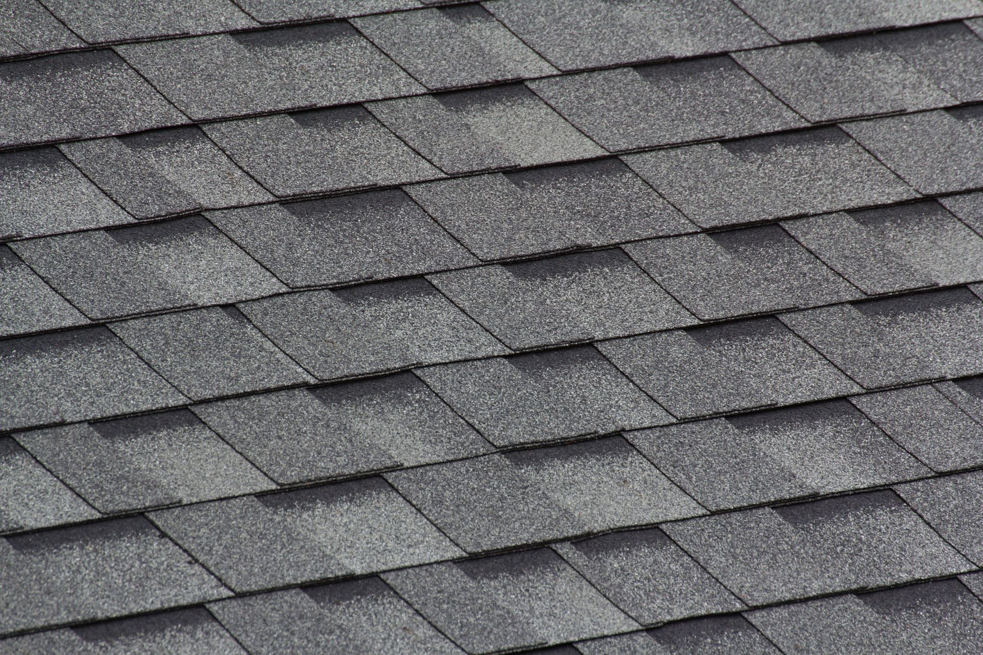 Gray asphalt roof shingles.