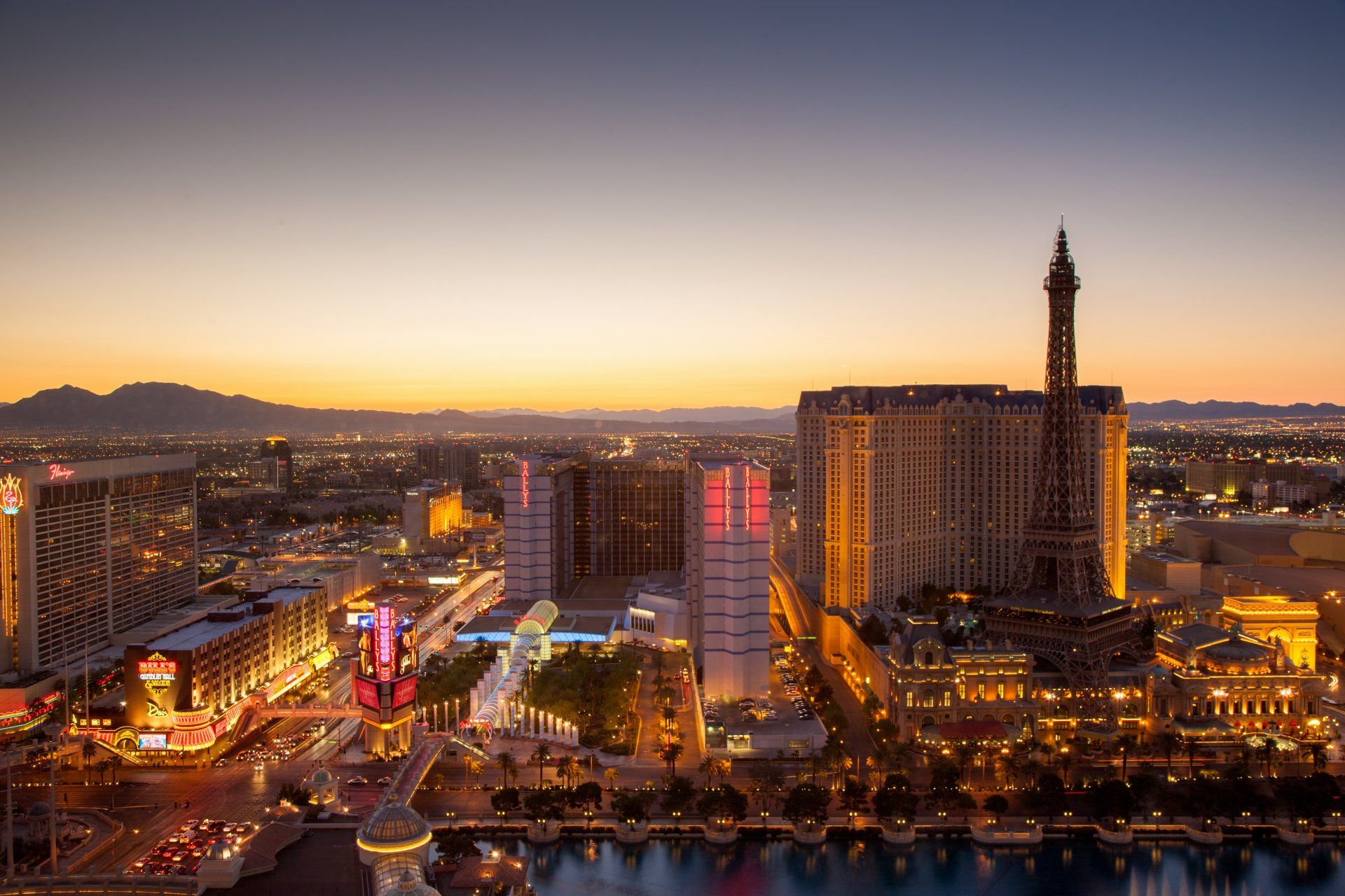 An aerial view of the city of las vegas at sunset.