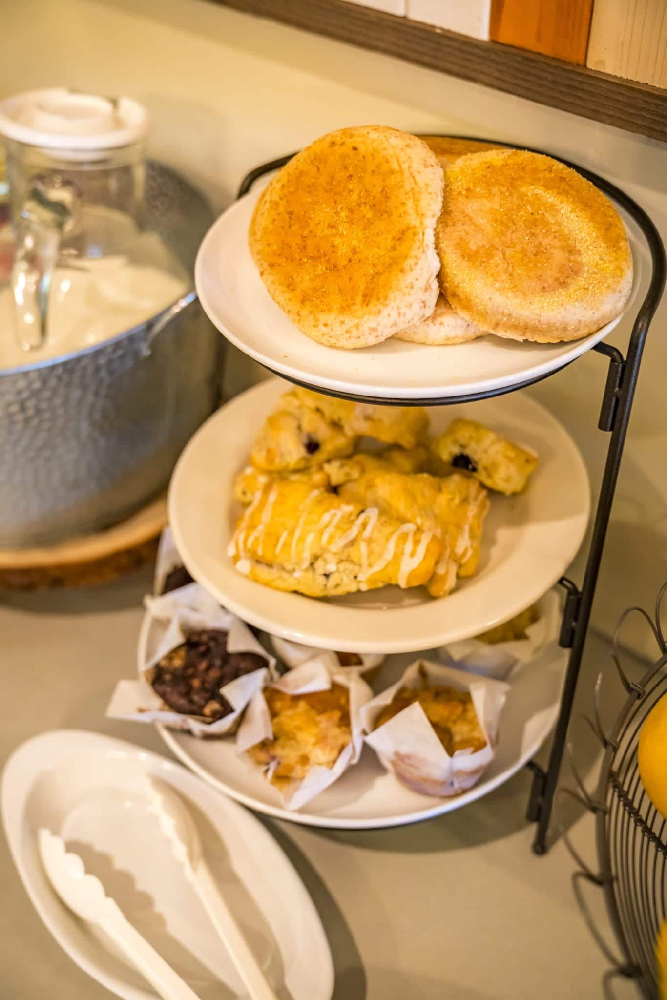 There are many different types of food on the plates on the table.