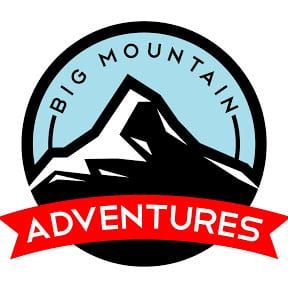 A logo for big mountain adventures with a mountain in the center.