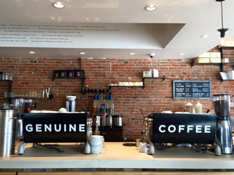 A coffee shop with two genuine coffee machines