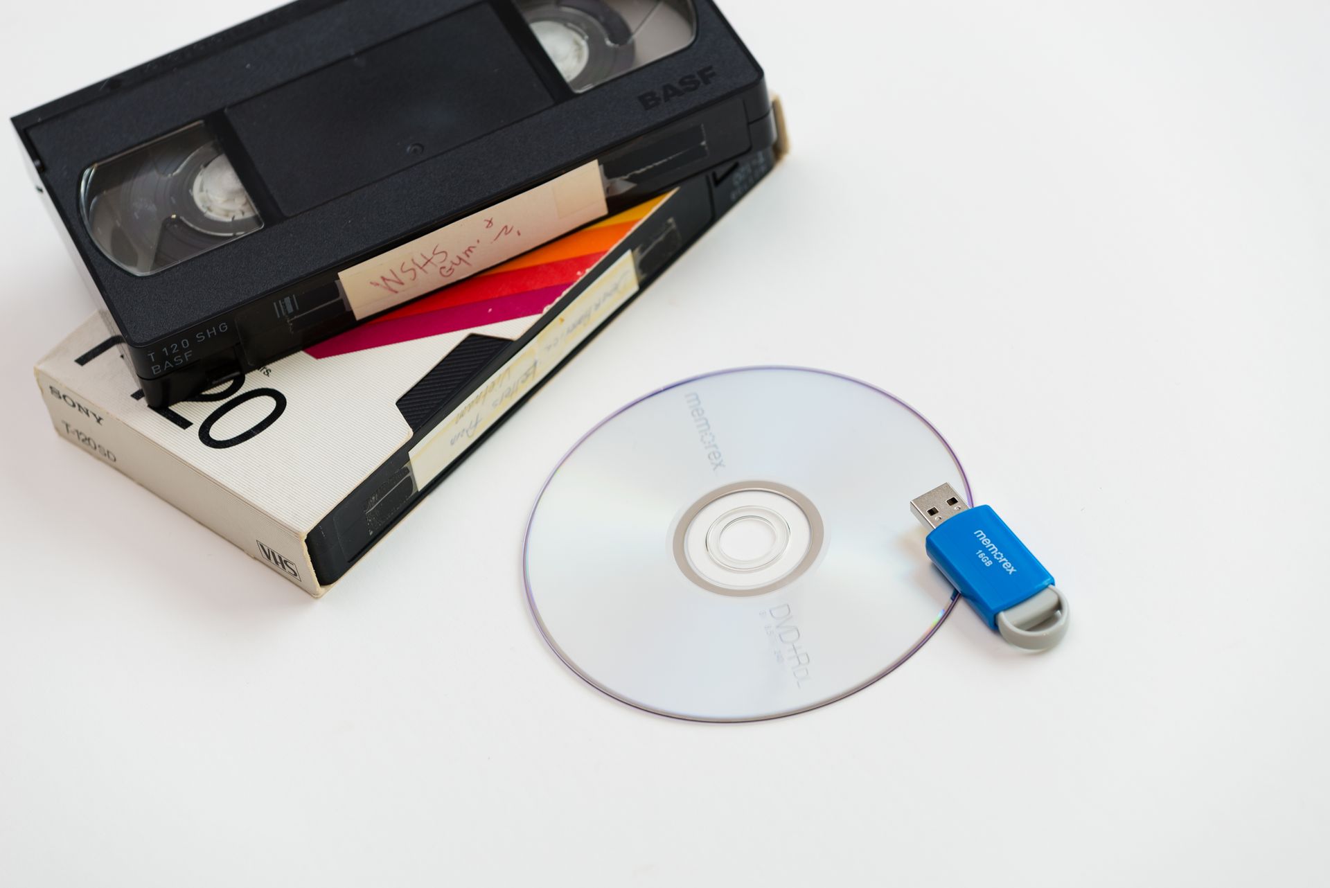 A close up of a film reel on a white surface